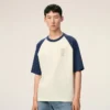 Ami de Coeur T-Shirt din bumbac alb și albastru cu patch-uri tricotate Ami de Coeur T-Shirt din bumbac alb și albastru cu patch-uri tricotate