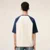 Ami de Coeur T-Shirt din bumbac alb și albastru cu patch-uri tricotate Ami de Coeur T-Shirt din bumbac alb și albastru cu patch-uri tricotate