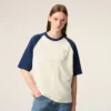 Ami de Coeur T-Shirt din bumbac alb și albastru cu patch-uri tricotate Ami de Coeur T-Shirt din bumbac alb și albastru cu patch-uri tricotate