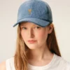 Șapcă din denim albastru cu broderie „Ami de Coeur” Șapcă din denim albastru cu broderie „Ami de Coeur”