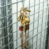 Breloc Ami de Coeur din piele maro și metal cu perle Breloc Ami de Coeur din piele maro și metal cu perle