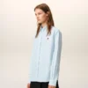 Cămașă clasică din bumbac albastru, cu mâneci lungi, guler cu nasturi și broderie ADC