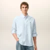 Cămașă clasică din bumbac albastru, cu mâneci lungi, guler cu nasturi și broderie ADC
