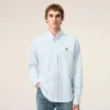 Cămașă clasică din bumbac albastru, cu mâneci lungi, guler cu nasturi și broderie ADC