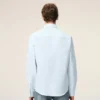 Cămașă clasică din bumbac albastru, cu mâneci lungi, guler cu nasturi și broderie ADC