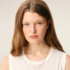 Colier cu pandantiv „0” din alamă aurie ciocănită Colier cu pandantiv „0” din alamă aurie ciocănită
