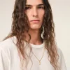Colier cu pandantiv „7” din alamă aurie ciocănită Colier cu pandantiv „7” din alamă aurie ciocănită