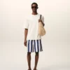 Costum de baie cu dungi lungi albe și bleumarin Costum de baie cu dungi lungi albe și bleumarin