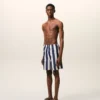 Costum de baie cu dungi lungi albe și bleumarin Costum de baie cu dungi lungi albe și bleumarin