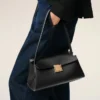 Geantă mică Mimi din piele de vacă neagră