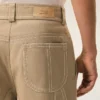 Pantaloni de lucru din bumbac bej Pantaloni de lucru din bumbac bej