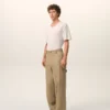 Pantaloni de lucru din bumbac bej Pantaloni de lucru din bumbac bej