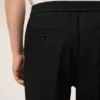 Pantaloni din lână neagră cu talie elastică Pantaloni din lână neagră cu talie elastică
