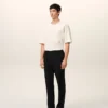 Pantaloni din lână neagră cu talie elastică Pantaloni din lână neagră cu talie elastică