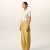Pantaloni galbeni din lână nouă, cu curele înfășurate