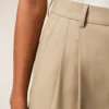 Pantaloni largi bej din lână nouă, cu talie înaltă și două pliuri