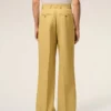 Pantaloni largi cu talie joasă din lână nouă galbenă Pantaloni largi cu talie joasă din lână nouă galbenă