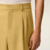 Pantaloni largi cu talie joasă din lână nouă galbenă Pantaloni largi cu talie joasă din lână nouă galbenă
