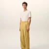 Pantaloni largi cu talie joasă din lână nouă galbenă Pantaloni largi cu talie joasă din lână nouă galbenă