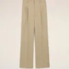 Pantaloni largi din lână nouă, de culoare bej, cu talie joasă Pantaloni largi din lână nouă, de culoare bej, cu talie joasă
