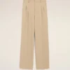 Pantaloni largi din lână nouă, de culoare bej, cu talie joasă Pantaloni largi din lână nouă, de culoare bej, cu talie joasă