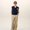 Pantaloni largi din lână nouă, de culoare bej, cu talie joasă Pantaloni largi din lână nouă, de culoare bej, cu talie joasă