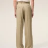 Pantaloni largi din lână nouă, de culoare bej, cu talie joasă Pantaloni largi din lână nouă, de culoare bej, cu talie joasă
