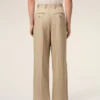 Pantaloni largi din lână nouă, de culoare bej, cu talie joasă Pantaloni largi din lână nouă, de culoare bej, cu talie joasă