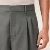 Pantaloni largi din lână nouă, de culoare gri, cu talie joasă Pantaloni largi din lână nouă, de culoare gri, cu talie joasă