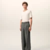 Pantaloni largi din lână nouă, de culoare gri, cu talie joasă Pantaloni largi din lână nouă, de culoare gri, cu talie joasă