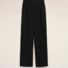 Pantaloni largi din lână nouă, de culoare neagră, cu talie joasă Pantaloni largi din lână nouă, de culoare neagră, cu talie joasă
