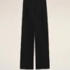 Pantaloni largi din lână nouă, de culoare neagră, cu talie joasă Pantaloni largi din lână nouă, de culoare neagră, cu talie joasă