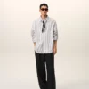 Pantaloni largi din lână nouă, de culoare neagră, cu talie joasă Pantaloni largi din lână nouă, de culoare neagră, cu talie joasă