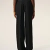 Pantaloni largi din lână nouă, de culoare neagră, cu talie joasă Pantaloni largi din lână nouă, de culoare neagră, cu talie joasă