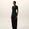 Pantaloni largi din lână nouă, de culoare neagră, cu talie joasă Pantaloni largi din lână nouă, de culoare neagră, cu talie joasă