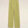 Pantaloni largi din lână nouă, de culoare verde, cu talie joasă Pantaloni largi din lână nouă, de culoare verde, cu talie joasă