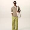Pantaloni largi din lână nouă, de culoare verde, cu talie joasă Pantaloni largi din lână nouă, de culoare verde, cu talie joasă