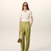 Pantaloni largi din lână nouă, de culoare verde, cu talie joasă Pantaloni largi din lână nouă, de culoare verde, cu talie joasă