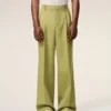 Pantaloni largi din lână nouă, de culoare verde, cu talie joasă Pantaloni largi din lână nouă, de culoare verde, cu talie joasă