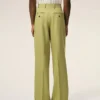 Pantaloni largi din lână nouă, de culoare verde, cu talie joasă Pantaloni largi din lână nouă, de culoare verde, cu talie joasă