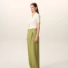 Pantaloni largi din lână nouă, de culoare verde, cu talie joasă Pantaloni largi din lână nouă, de culoare verde, cu talie joasă
