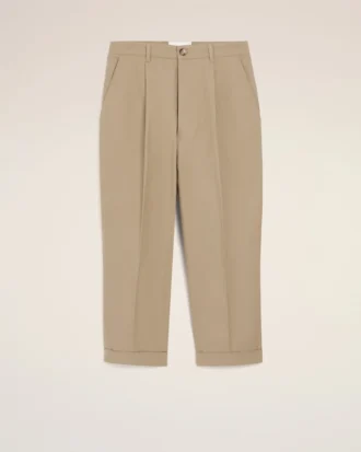Pantaloni oversized bej din bumbac, croi carotă