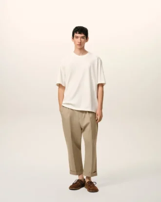 Pantaloni oversized bej din bumbac, croi carotă