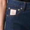 Pantaloni scurți din bumbac albastru cu eticheta Ami Paris Heritage