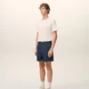 Pantaloni scurți din bumbac albastru cu eticheta Ami Paris Heritage