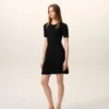 Rochie mini din tricot negru cu godet