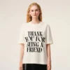 Tricou alb din bumbac cu imprimeu caracteristic