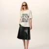 Tricou alb din bumbac cu imprimeu caracteristic