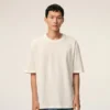Tricou din bumbac alb Ami de Coeur cu imprimeu în relief Tricou din bumbac alb Ami de Coeur cu imprimeu în relief