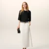 Tricou negru din satin cu mâneci scurte și detalii din tricot Tricou negru din satin cu mâneci scurte și detalii din tricot